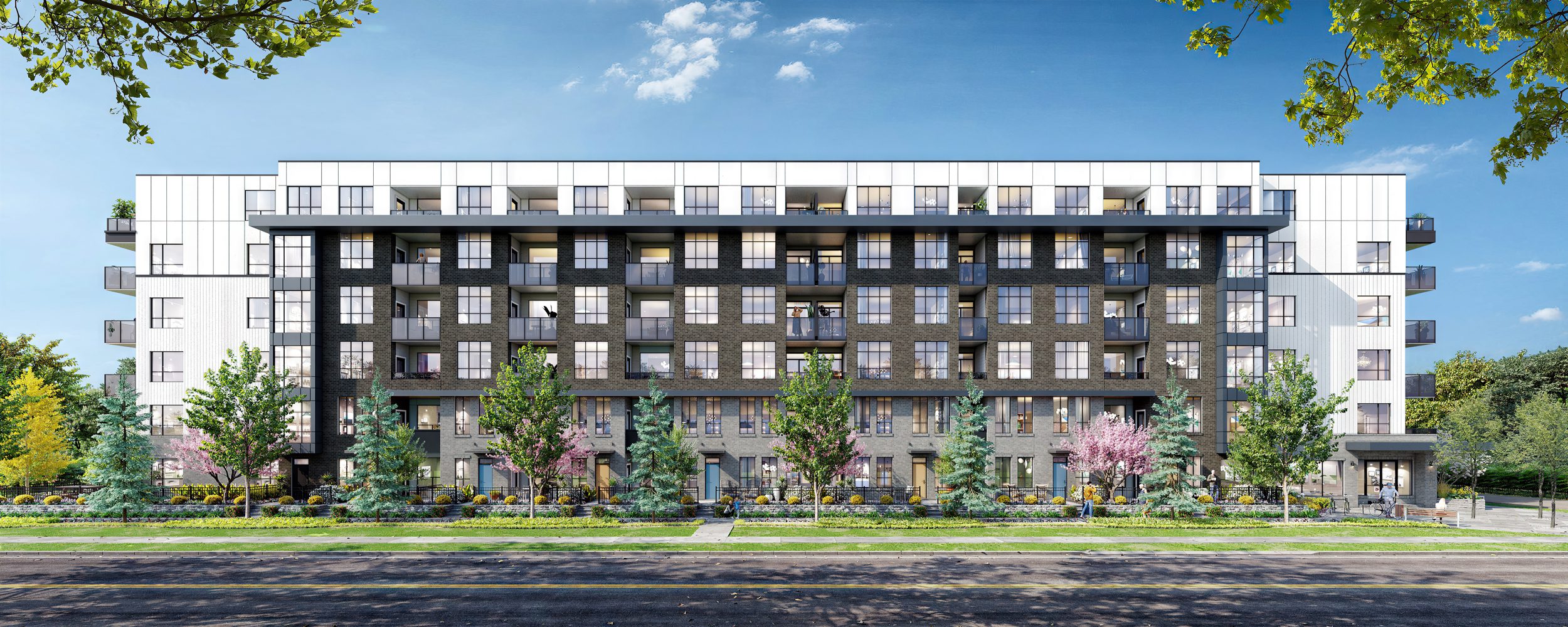 Wide view of the Fleetwood Village 2 condo building showcasing contemporary architecture, landscaped surroundings, and SkyTrain proximity.